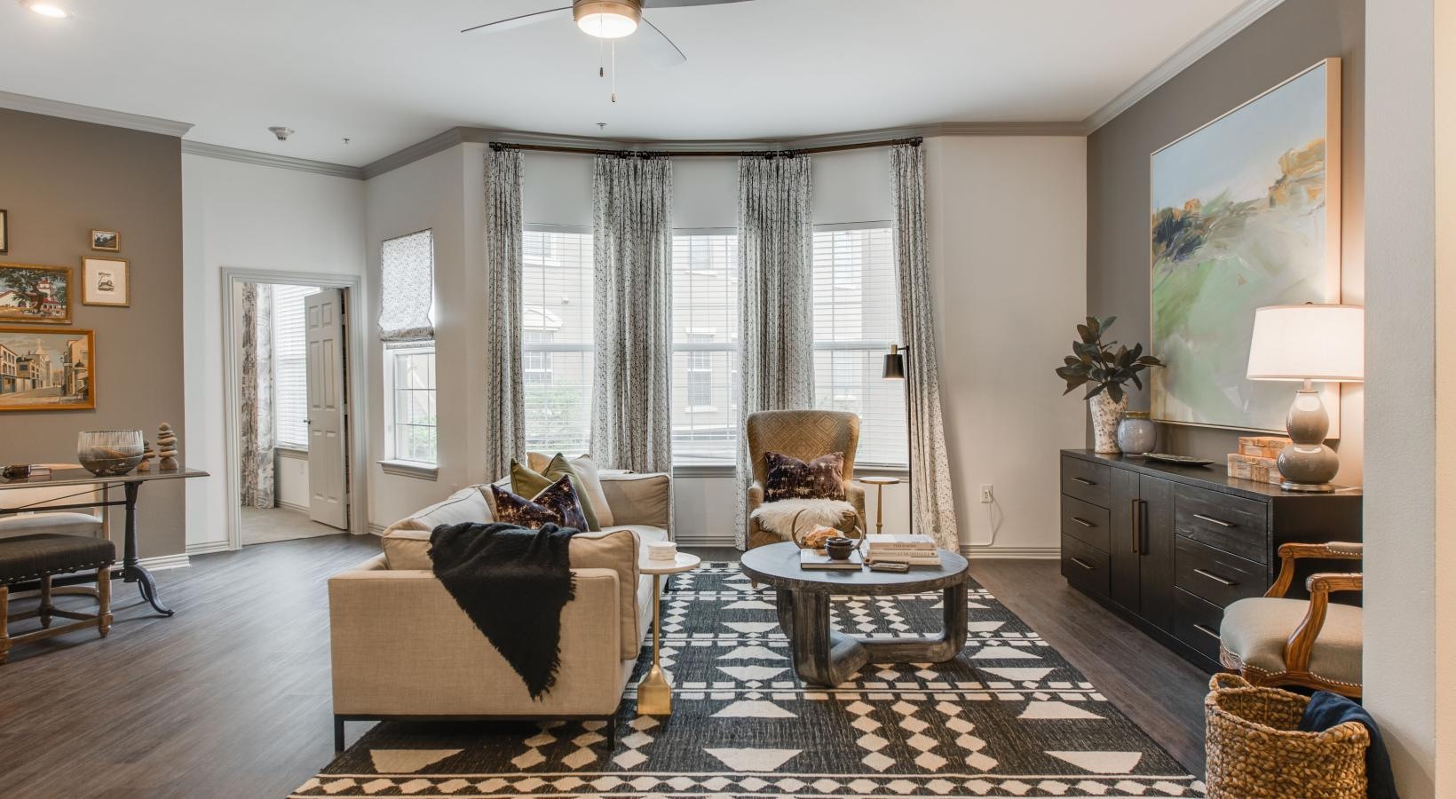Beautiful living spaces with natural lighting a living room with a large window