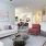 Furnished apartment living area filled with natural light inside a home at Alto Highland Park