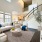 Furnished apartment living room with ample natural lighting inside a home at Alto Highland Park