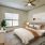 Furnished apartment bedroom with a ceiling fan and large window at Alto Highland Park