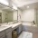Apartment bathroom with a large soaking tub inside homes at Alto Highland Park