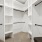 Spacious walk-in closet with shelving