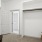 Spacious walk-in closet with shelving