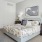 Bedroom with natural lighting and high ceilings