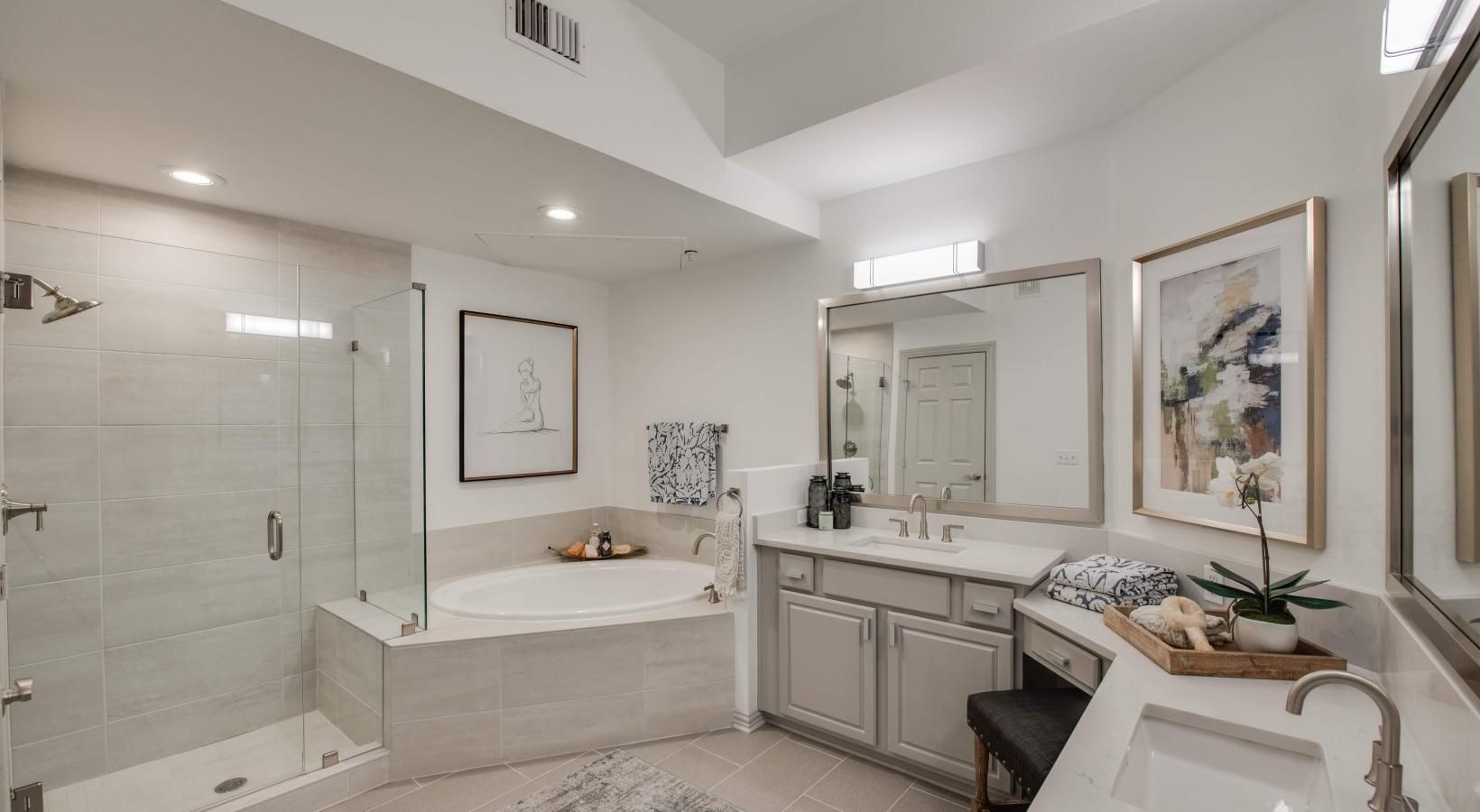Spacious bathrooms with everything you need a bathroom with a tub sink and a toilet