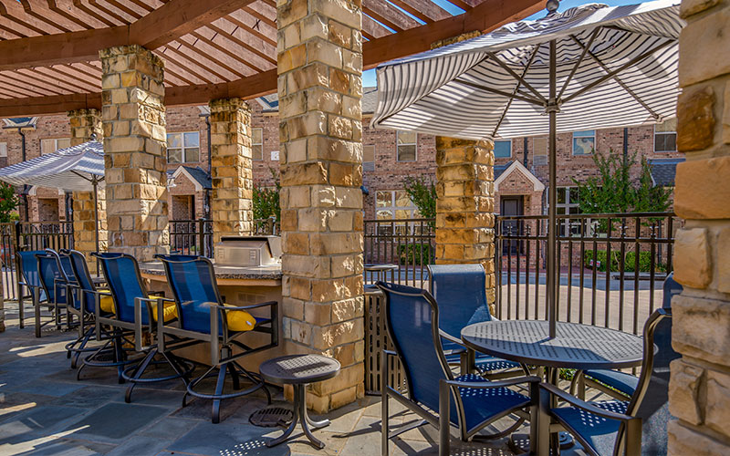 BBQ station and outdoor dining area - Alto at Highland Park